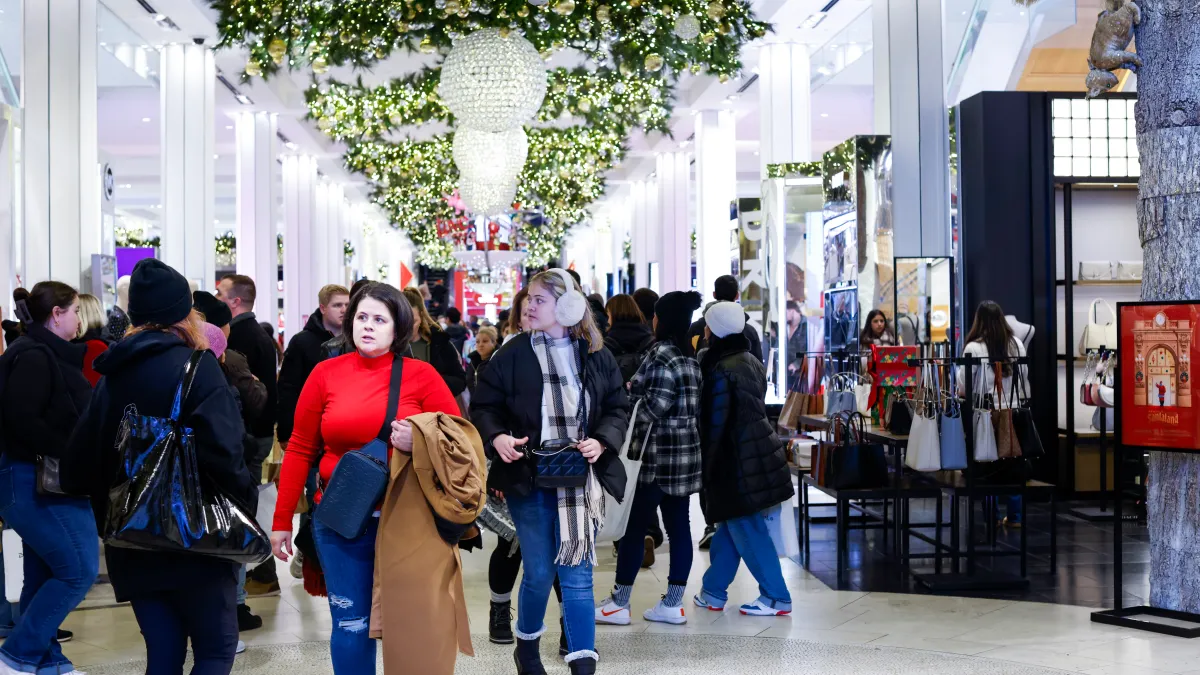 Busy shopping center during holiday season boosting retail sales