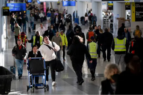 International travelers at a busy airport in 2025 as global tourism recovers