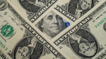 Investors analyzing charts amid shifting interest rate expectations