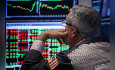 S&P 500 reaches record high as health insurers weigh on Dow Jones