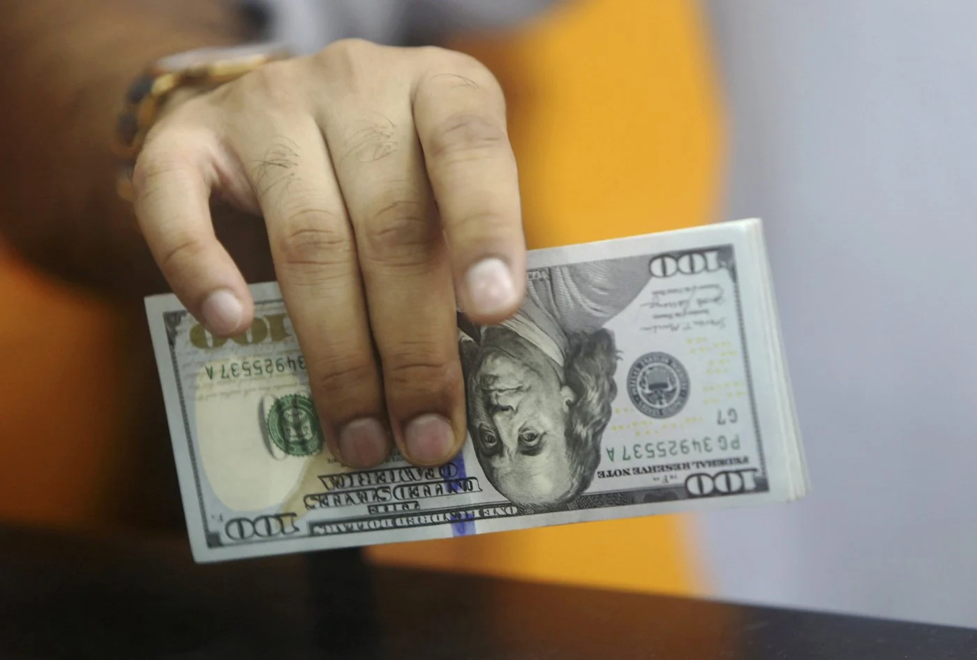 U.S. dollar stabilizes after policy-driven selloff in currency markets